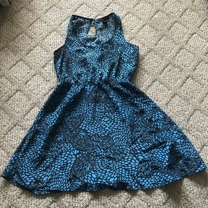 Material Girl blue dress with black petal detail